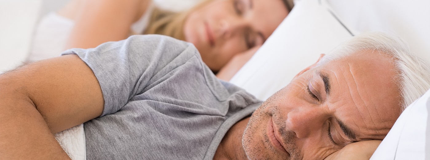 Man and woman sleeping peacefully