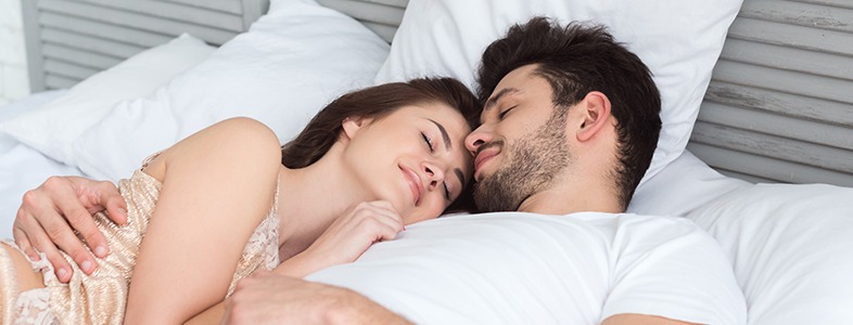 Man and woman sleeping deeply