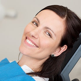 Smiling woman in dental chair