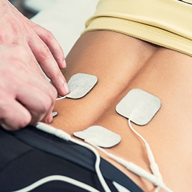 Patient receiving TENS treatment