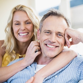 Man and woman smiling together