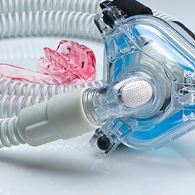 Oral appliance and CPAP mask