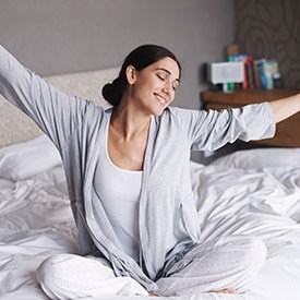 Woman waking up refreshed