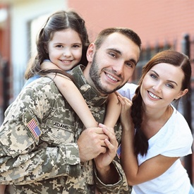 young soldier with family