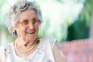 Elderly woman enjoying a long life