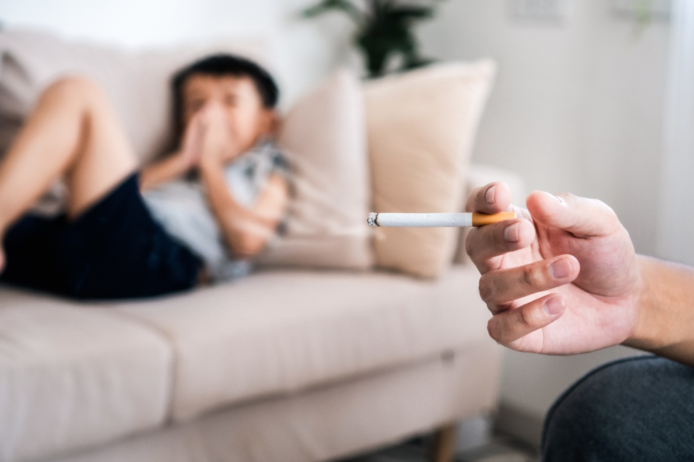 young boy exposed to secondhand smoke